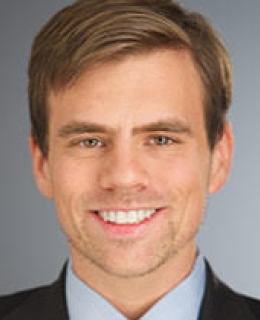 Headshot of Alex Hogan